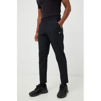 Reebok pantaloni de antrenament DMX barbati, culoarea negru, neted ieftini