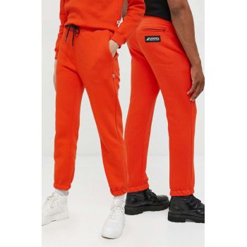Kangol pantaloni de trening unisex, culoarea portocaliu, neted la reducere