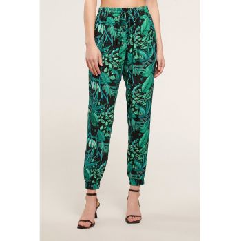 Pantaloni cu imprimeu tropical si buzunare laterale