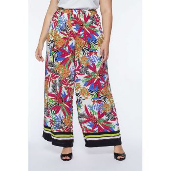 Pantaloni cu croiala ampla si model tropical