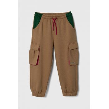 Sisley pantaloni de trening pentru copii culoarea bej, neted