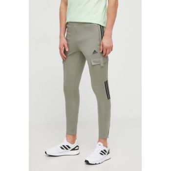 adidas pantaloni de trening TIRO culoarea verde, cu imprimeu IS1543