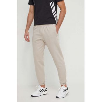 adidas Originals pantaloni de trening din bumbac culoarea bej, uni IR7887