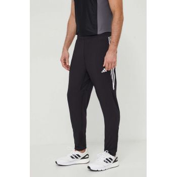 adidas Performance pantaloni de alergare Own the Run culoarea negru, cu imprimeu IK4982