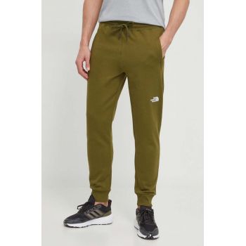 The North Face pantaloni de trening din bumbac culoarea verde, neted