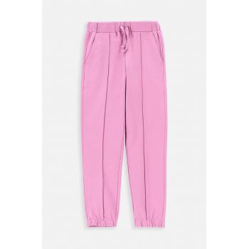 Coccodrillo pantaloni de trening pentru copii culoarea roz, cu imprimeu