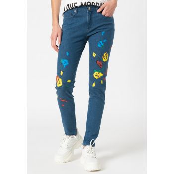 Blugi skinny cu talie joasa si imprimeu floral