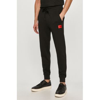 HUGO pantaloni de trening din bumbac barbati, culoarea negru, neted