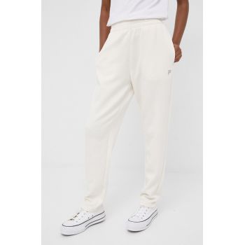 Fila pantaloni de trening femei, culoarea bej, neted ieftin