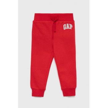 GAP pantaloni de trening pentru copii culoarea rosu, neted