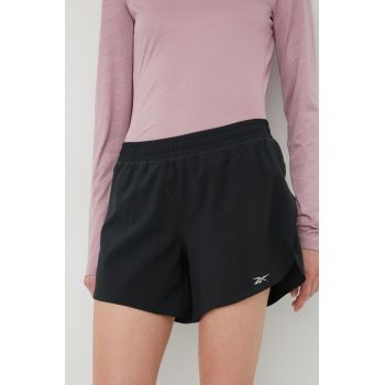 Reebok pantaloni scurți de alergare HA1043 femei, culoarea negru, neted, medium waist