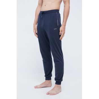 BOSS pantaloni de pijama barbati, culoarea albastru marin, cu imprimeu de firma originale