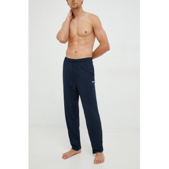 BOSS pantaloni de pijama barbati, culoarea albastru marin, neted