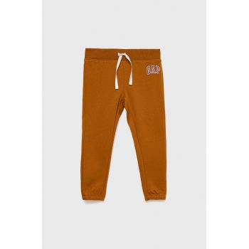 GAP pantaloni de trening pentru copii culoarea portocaliu, cu imprimeu