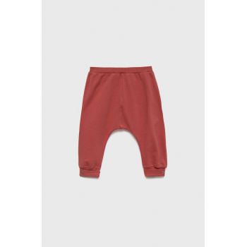 United Colors of Benetton pantaloni de trening pentru copii culoarea roz, neted ieftini