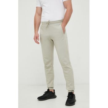 Puma pantaloni de trening barbati, culoarea verde, neted