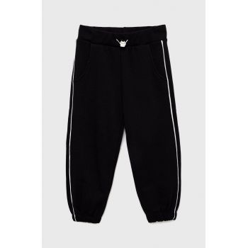 Sisley pantaloni de trening din bumbac pentru copii culoarea negru, neted ieftini
