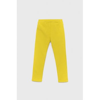 United Colors of Benetton pantaloni copii culoarea galben, neted
