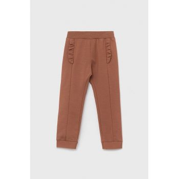 United Colors of Benetton pantaloni de trening pentru copii culoarea maro, neted ieftini