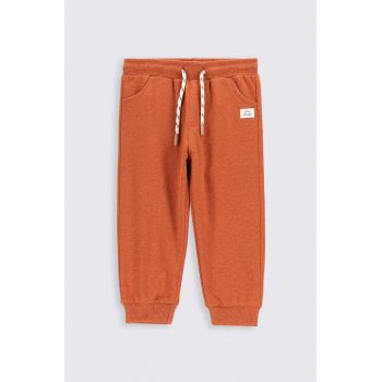 Coccodrillo pantaloni de trening pentru copii culoarea portocaliu, neted