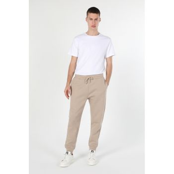 Pantaloni sport cu snur de ajustare