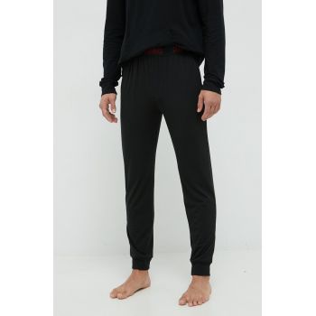 HUGO pantaloni de pijama barbati, culoarea negru, neted ieftine