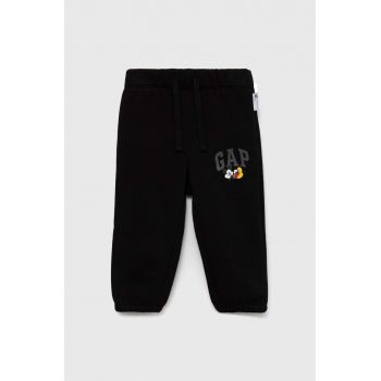 GAP pantaloni de trening pentru copii X Disney culoarea negru, neted