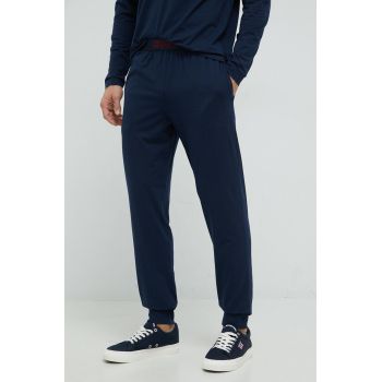 HUGO pantaloni de pijama barbati, culoarea albastru marin, neted de firma originale