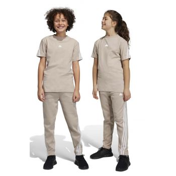 Adidas pantaloni de trening pentru copii U FI 3S culoarea bej, cu imprimeu