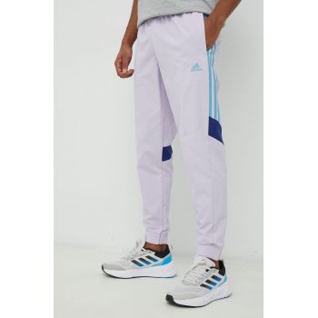 Adidas pantaloni de trening barbati, culoarea violet, cu imprimeu ieftini