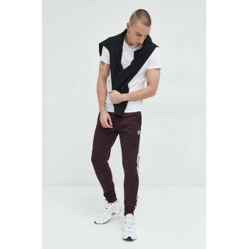Adidas Originals pantaloni de trening barbati, culoarea bordo, neted ieftini