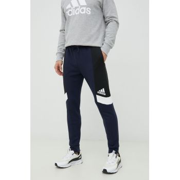 Adidas pantaloni de trening barbati, culoarea albastru marin, modelator