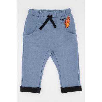Pantaloni sport cu terminatie rasucita