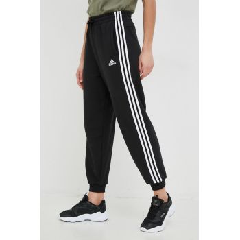 Adidas pantaloni de trening din bumbac femei, culoarea negru, cu imprimeu ieftin