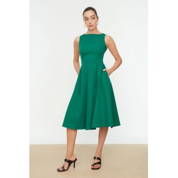 Rochie midi evazata cu buzunare laterale