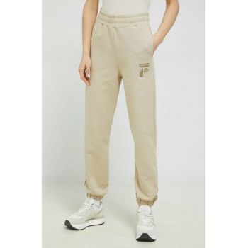 Fila pantaloni de trening din bumbac culoarea bej, neted de firma original