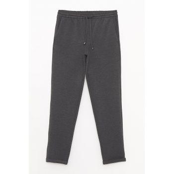 Pantaloni jogger cu buzunare cu refilet