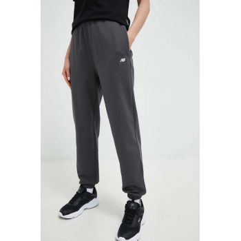 New Balance pantaloni de trening din bumbac culoarea gri, neted de firma original