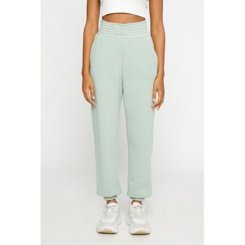 Pantaloni sport cu buzunare laterale