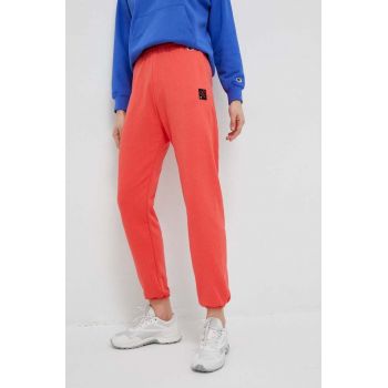 Champion pantaloni de trening culoarea portocaliu, neted ieftin