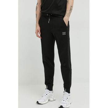 HUGO pantaloni de trening culoarea negru, cu imprimeu