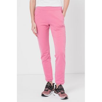 Pantaloni sport cu talie medie si buzunare oblice la reducere