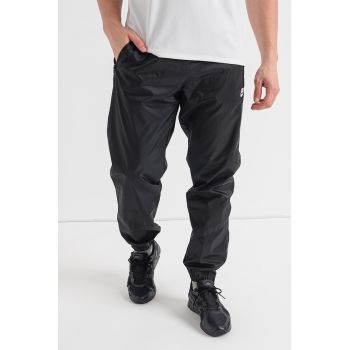 Pantaloni sport cu slituri cu fermoar la glezna Windrunner