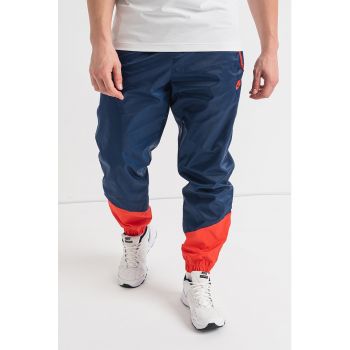 Pantaloni sport cu slituri cu fermoar la glezna Windrunner