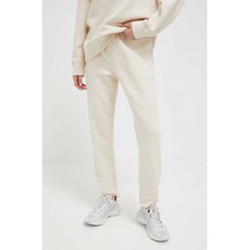 Casall pantaloni de trening culoarea bej, neted