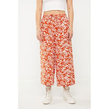 Pantaloni crop cu croiala ampla si imprimeu