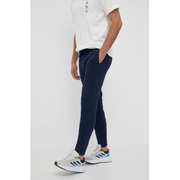 Champion pantaloni de trening culoarea albastru marin, neted