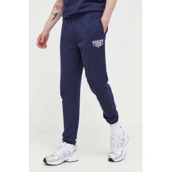 Tommy Jeans pantaloni de bumbac culoarea albastru marin, neted de firma originali