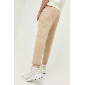 Nicce pantaloni de trening culoarea bej, cu imprimeu de firma originali