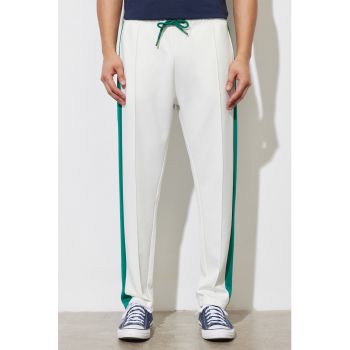 Pantaloni sport cu insertii contrastante